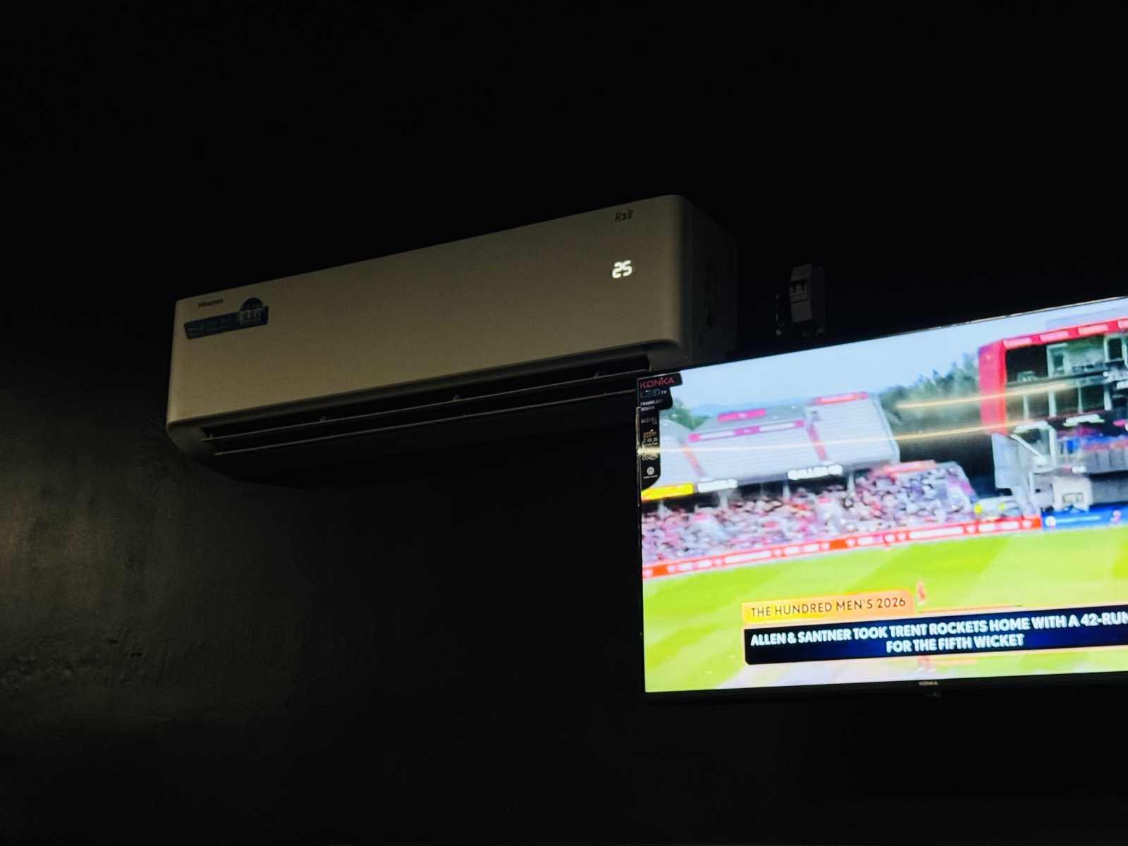 Air conditioning unit and a wall-mounted TV above the training floor