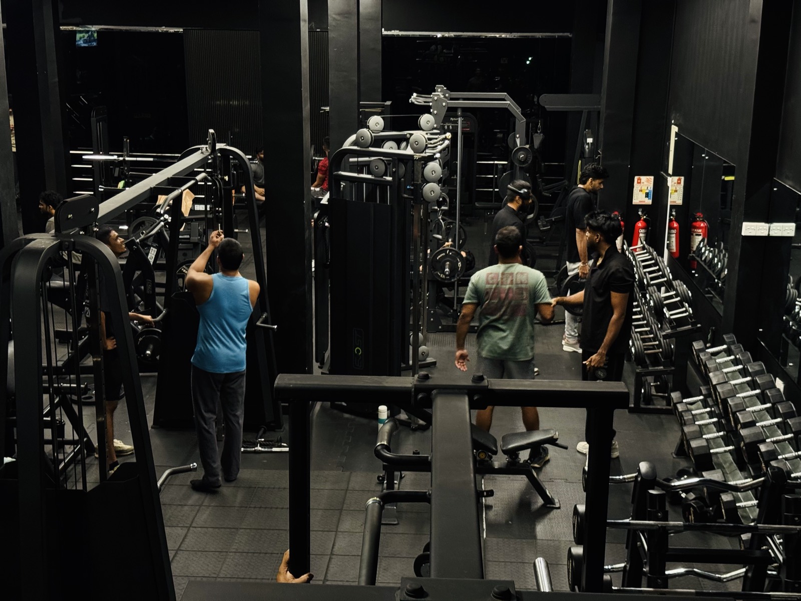 Squat racks, cable towers and benches on the Premium Fitness floor